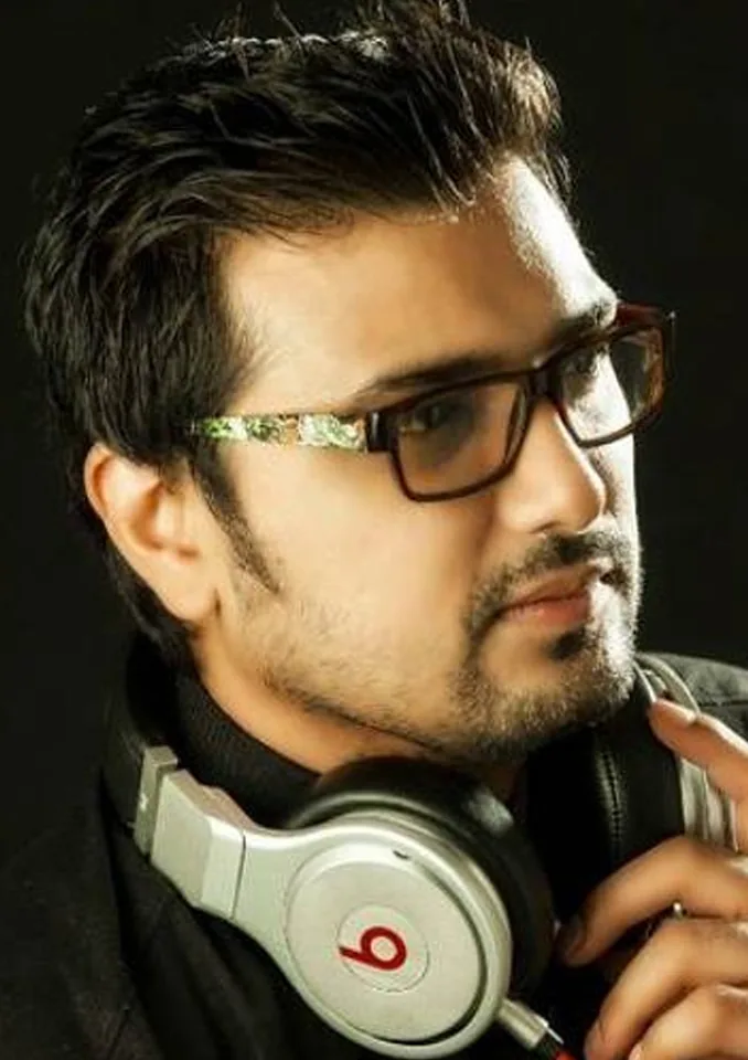 Piyush Mehta in his early years, headphones around his neck