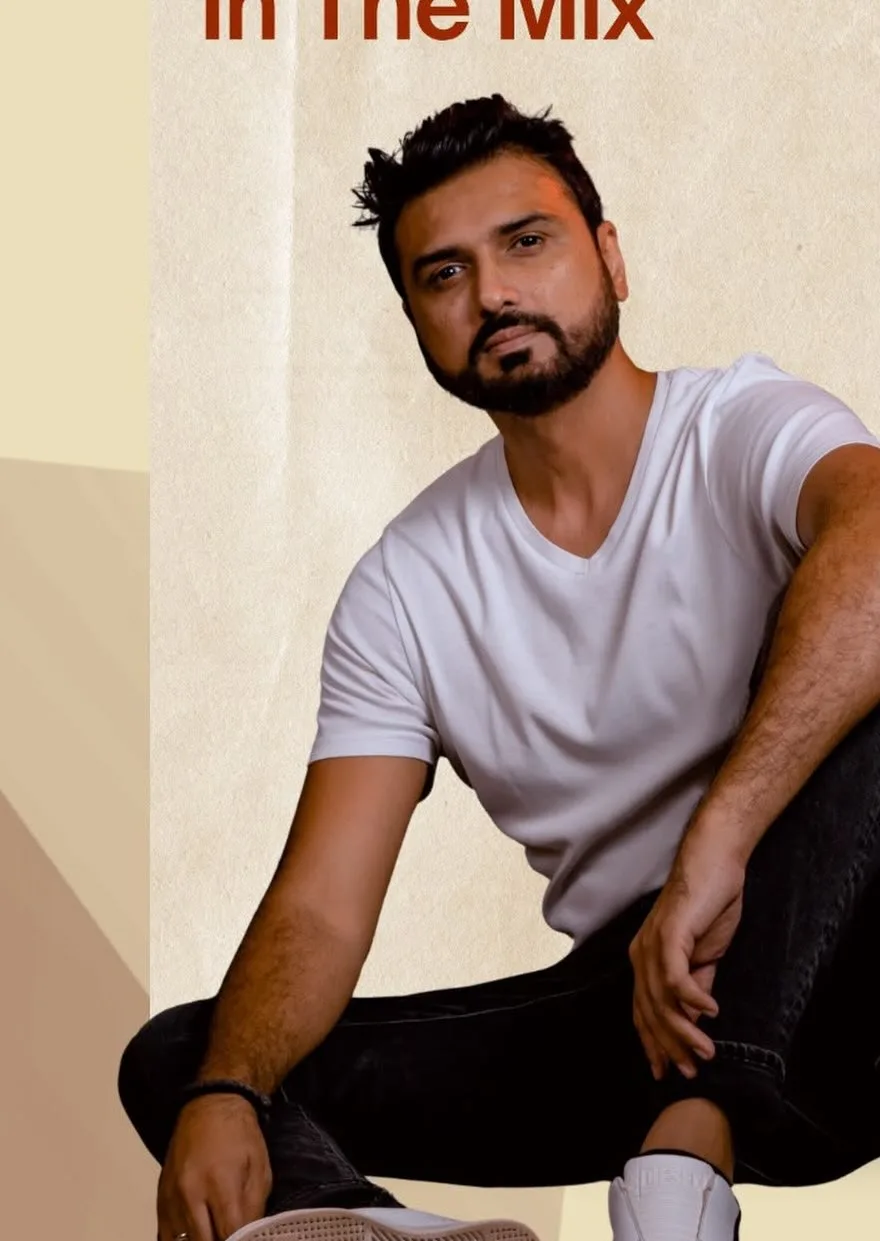Piyush Mehta portrait in a white T-shirt
